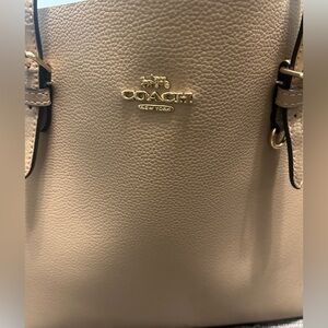 Taupe Bag from coach only been worn a few times.